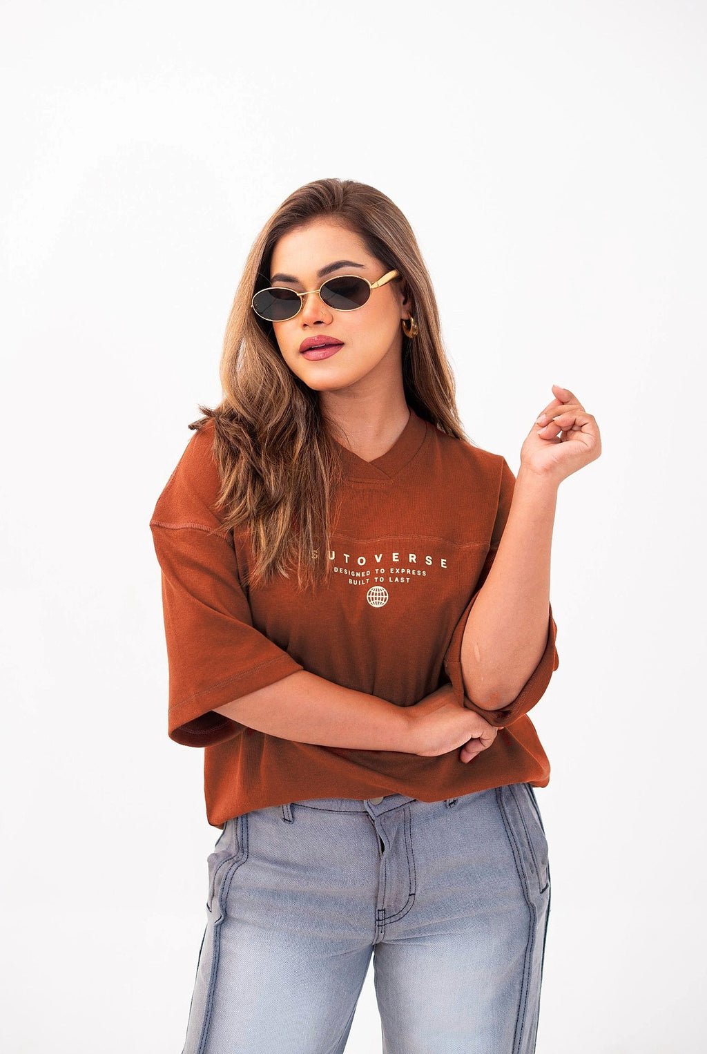 Sutoverse brown oversized drop tee, portrait with sunglasses
