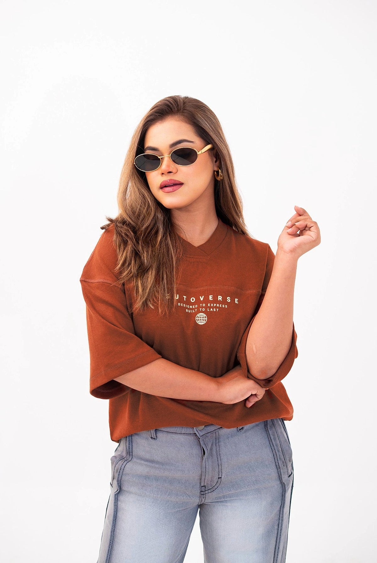 Sutoverse brown oversized drop tee, portrait with sunglasses